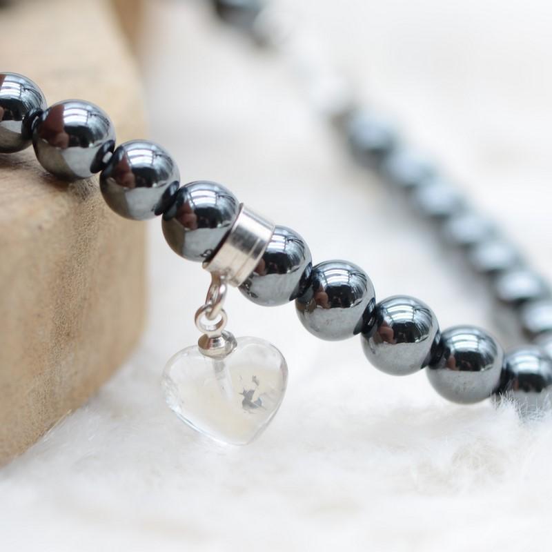 Bracelet "Dissipation" en Hématite (Cœur en Quartz) - lespierresdubienetre