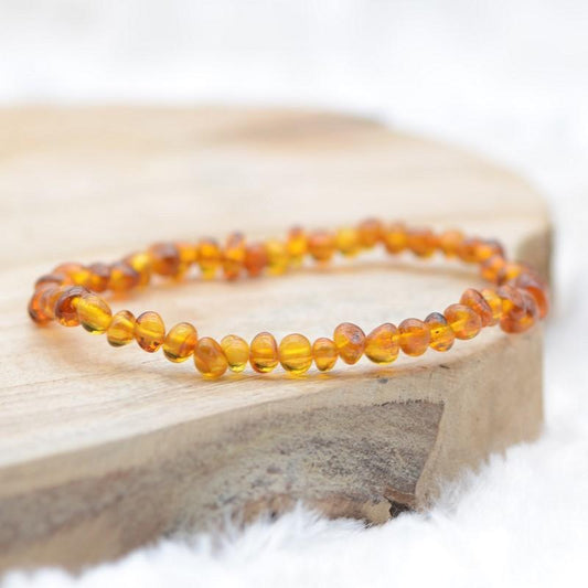 Bracelet "Renforcement" en Ambre Cognac Roulé - lespierresdubienetre